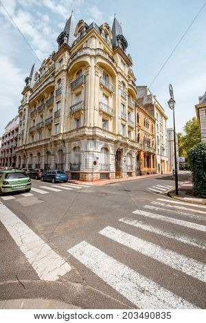VICHY, FRANCE - August 01, 2017: View on the beautiful old residential buildings in Vichy city in the Allier department of central France
