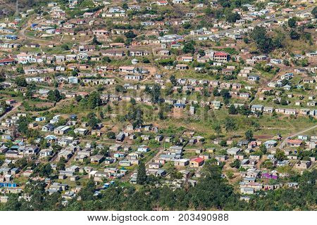 Birds Eye Overlooking rural community home houses in Marianhill highway landscape.
