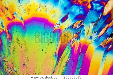 colorful microscopic shot of Trisodium citrate microcrystals in polarized light