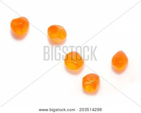 red caviar on a white background. macro