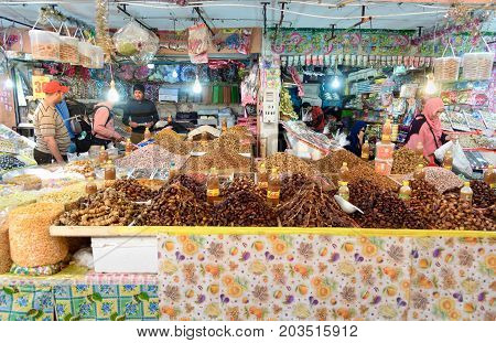 Tiznit. Morocco - December 27 2016: On local market in Tiznit. Moroccan people buy different products