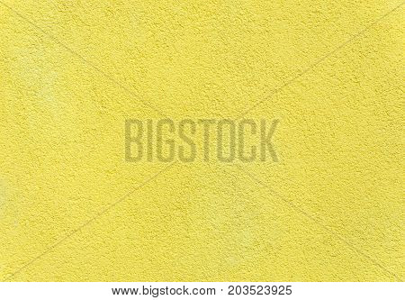 Yellow texture of plasterd wall. Abstract background.