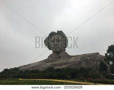 Changsha Hunan China , 1 February 2017 : Mao Zedong sculpture in orange Chau Tau island, Changsha City, Hunan Province, china