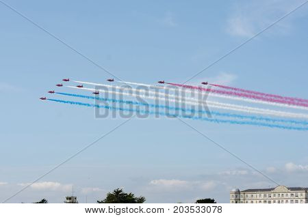 Clacton Essex United Kingdom -25 August 2017: Red arrows display team flying over Clacton in annual free air display