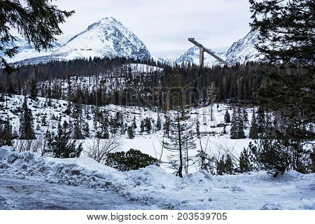 Solisko peak with springboard for ski jumping Strbske pleso Slovak republic. Winter mountains.