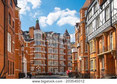 LONDON, UK - 25 August, 2017: Facade of the residential buildings in Kensington, the one of the most expensive places to live in UK