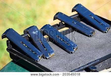 Magazines of the handgun in a row