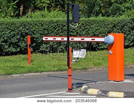 Parking lot gate at the end of the road