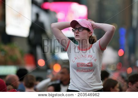 NEW YORK CITY - AUG. 26 : Unidentified people on the Times Square in Manhattan on August 26 2017 in New York City NY. Times Square is a major tourist destination and entertainment center.