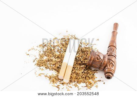 Wooden pipe loose tobacco and two cigarettes. Different forms of smoking. White background.