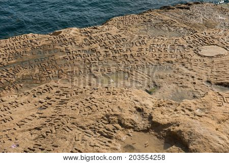 Carved And Engraved Names In The Rock