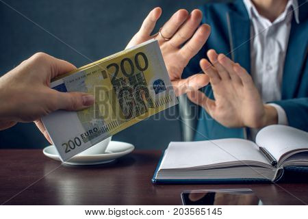 Man Businessman In Suit Refuses To Take The Money By Showing That He Is Not A Grafter. Concept Of Co