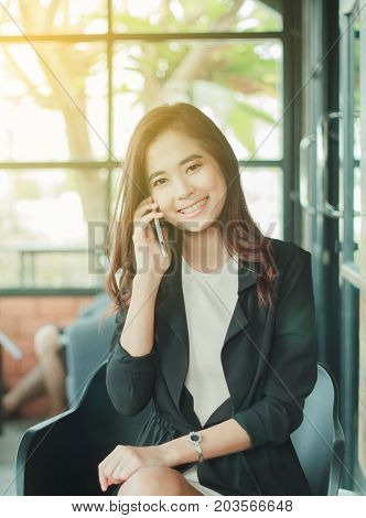 Businessmen And Women Are Using Mobile And Touch Smart Phone For Communication And Checking On Busin