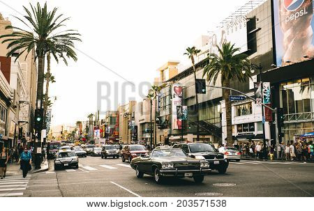 LOS ANGELES - OCTOBER 12 2015: View of Hollywood Boulevard at sunset. In 1958 the Hollywood Walk of Fame was created on this street as a tribute to artists working in the entertainment industry