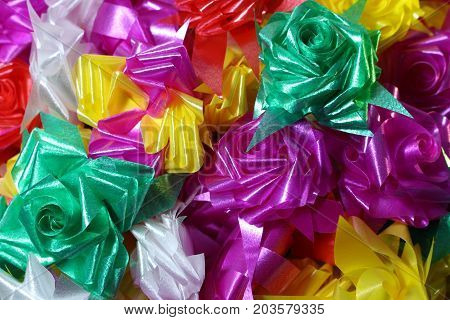 Set ribbon folded into a flower. Wrap coins by hand. for the sacred(ordination ,matriculation ,initiation) in Thailand
