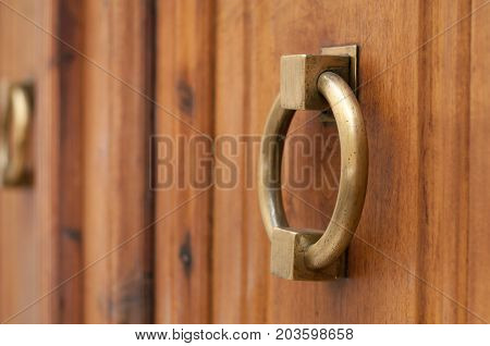 ancient iron door knocker on medieval house