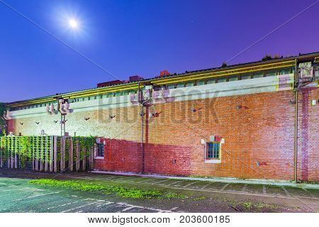 TAIPEI TAIWAN - JULY 11: This is a night view of Huashan 1914 Creative Park old architecture a popular landmark in Taipei on July 11 2017 in Taipei