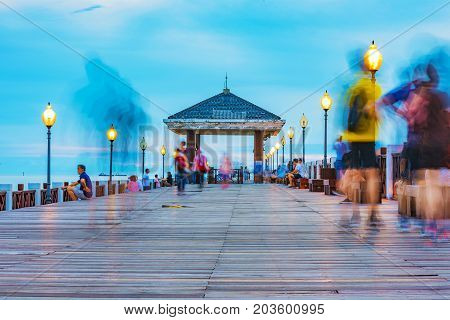 TAIPEI TAIWAN - JULY 05: This is an evening view a pier in the fisherman's wharf area of Tamsui where people come to enjoy the scenic views of the area on July 05 2017 in Taipei