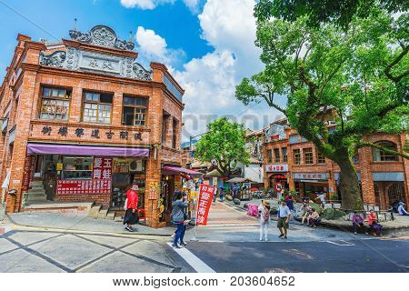 TAIPEI TAIWAN - JUNE 29: This is the entrance to Shenkeng old street a traditional old street which features old chinese arhcitecture and tradititonal shops and restaurants on June 29 2017 in Taipei