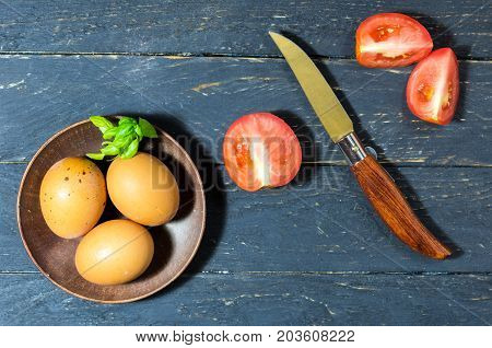 Chicken Eggs, Tomatoes And A Pocket Knife.