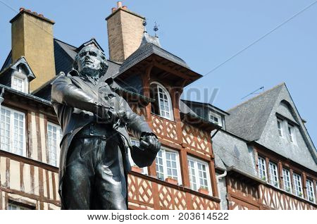 RENNES BRITTANY. August 27th 2017. The statue of Mayor Jean Leperdit keeps watch over Champ-Jacquet square in the old town of Rennes Brittany.