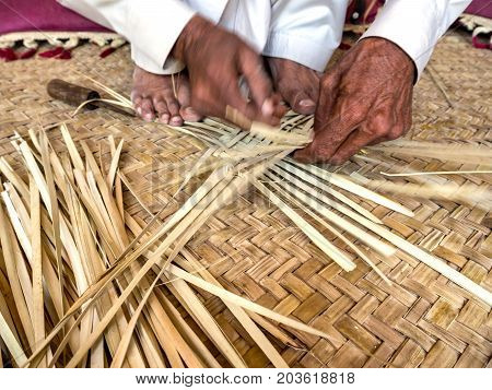 The weave crafts at work making baskets in Peshawar Pakistan