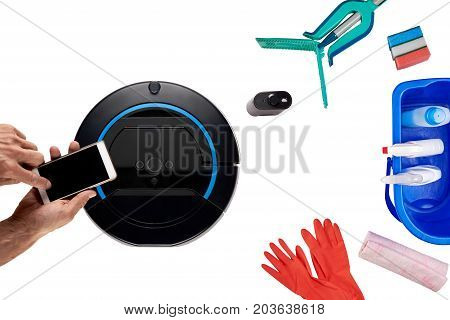 Set of classic cleaning equipment and modern with remote control of robotic vacuum cleaner