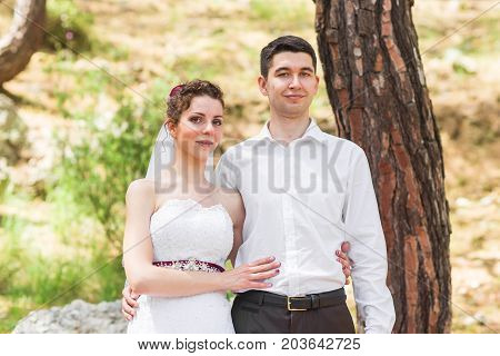 Romantic dating. Young loving couple embracing on nature.