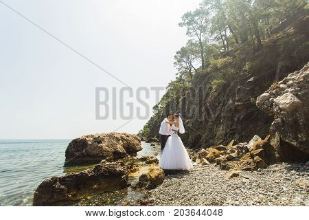 Romantic dating. Young loving couple embracing on nature.
