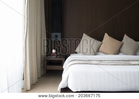 Decoration of the bedroom in earth tone.