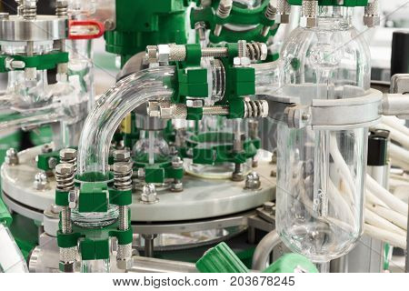 Fragment of chemical reactor equipment. Abstract industrial background.
