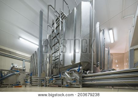 Rectangular steel tank. The system of storage and pumping of liquid.
