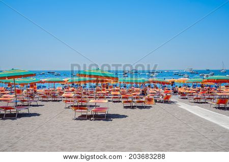 umrellas on the beach of Positano - famous old italian resort, Italy