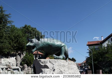 Beypazari Turkey - September 04, 2016; Anatolian Leopard Statue and Ottoman Homes in Beypazari, Ankara, Turkey