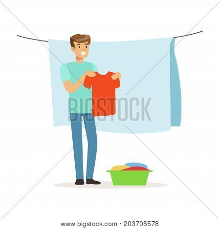 Young smiling man hanging wet clothes out to dry, house husband working at home vector Illustration on a white background