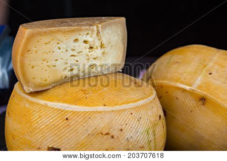 Few big orgainc cheese heads closeup. Food photo.