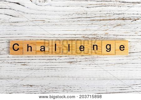 Challenge word made with wooden blocks concept