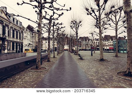 MAASTRICHT NETHERLANDS - JANUARY 09 2015: The streets in the historic center. Vintage toning. Stylization. Maastricht is the oldest city of the Netherlands and the capital city of the province of Limburg.