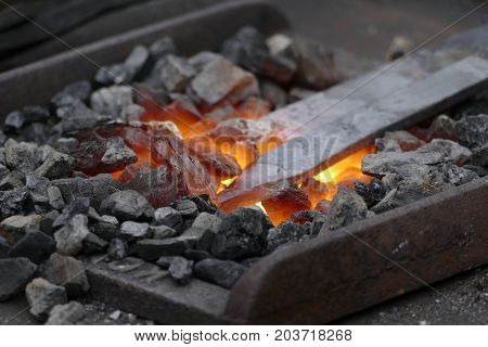 Blacksmith Wotk With Hammer And Hot Iron