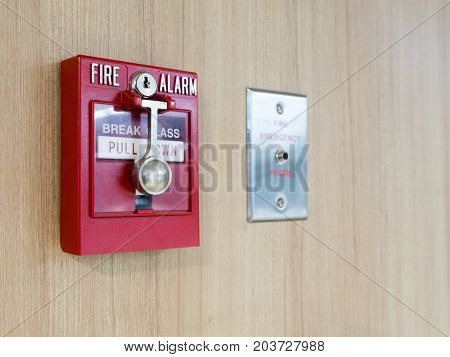 fire alarm box with fire fighters telephone on wall for warning and security system