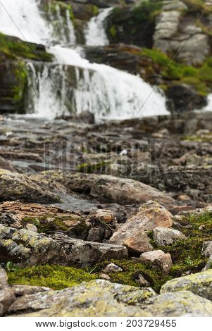 Waterfall in the mountains along the National tourist route Aurlandstjellet. Flotane. Western Norway