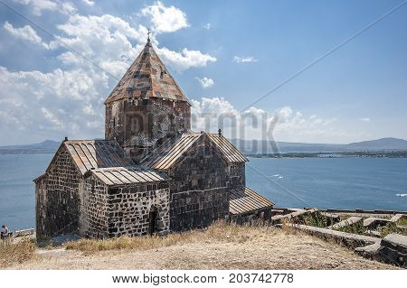 Armenia. The Church of Surb Arakelots in the Monastery of Sevanavank built in the eighth century. View of Lake Sevan.