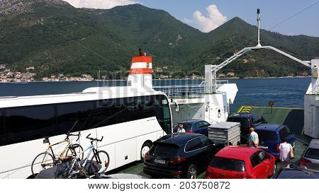 Kamenari, Montenegro - June 26, 2017: Ferries which transport cars the short distance from Lepetane to Kamenari on the Montenegrin coast.