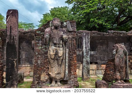 Statue of standing Buddha in Hatadage in Polonnaruwa ruins. Unesco world heritage on Sri Lanka.