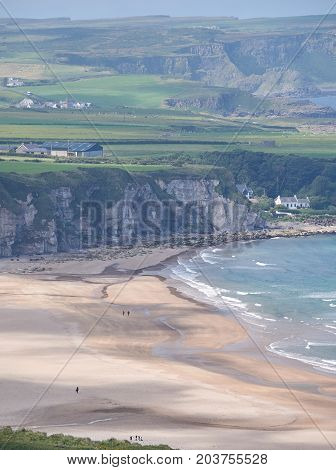 Whitepark Bay in Ballintoy, Antrim, Northern Ireland on a beautiful summer day