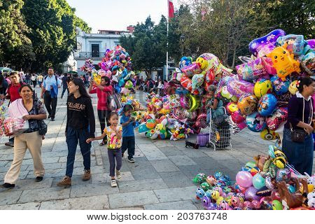 OAXACA MEXICO - MARCH 4: Balloons for sale in the Zocalo in Oaxaca Mexico on March 4 2017