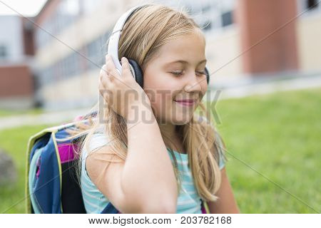 A nine years old girl student at school