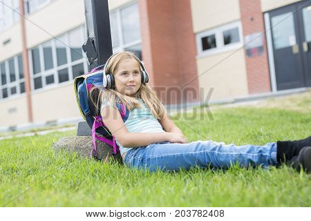 A nine years old girl student at school