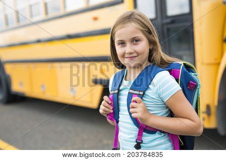 A nine years old girl student at school