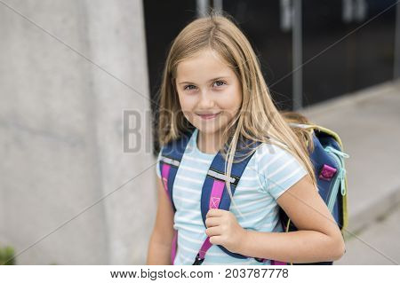 A nine years old girl student at school
